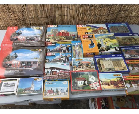 A collection of boxed N gauge trackside model kits of buildings including churches, Engine sheds and a cable car set etc, Bra