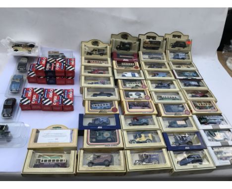 A collection of boxed, Lledo, Corgi diecast vehicles