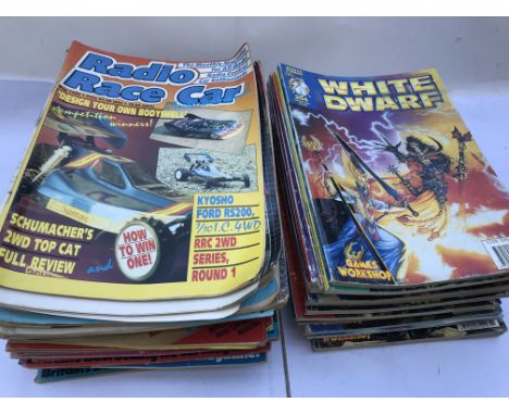 A collection of Radio controlled car magazines and Games workshop White Dwarf magazines