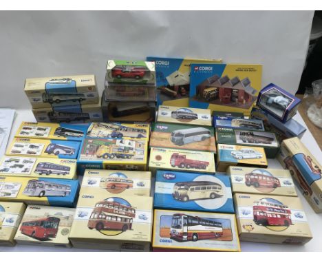A collection of boxed diecast vehicles including Corgi classics etc