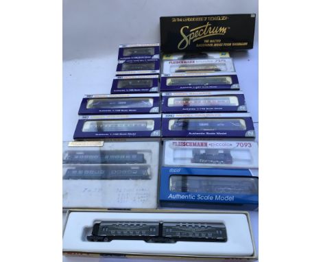 A collection of boxed N gauge railway , Locomotives and carriages including Dapol, Fleischmann etc