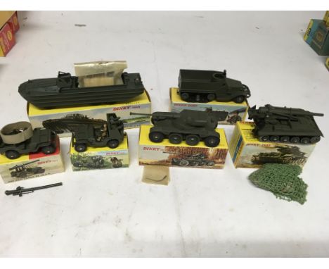 Dinky toys, boxed Diecast military vehicles, including a Military DUKW #825, Halftrack M3 #822, Jeep with cannon #829, Jeep w