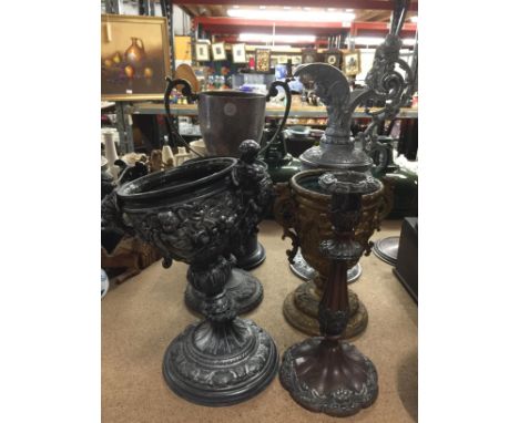 VARIOUS ORNATE METALWARE FOOTED CHALLIS CUPS TOGETHER WITH A LARGE JUG, CANDLESTICK AND TROPHY - CUPS FEATURING CHERUBS 