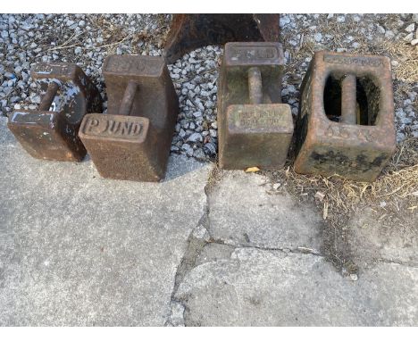 FOUR VINTAGE WEIGHTS ONE 28LB AND THREE 56LB 