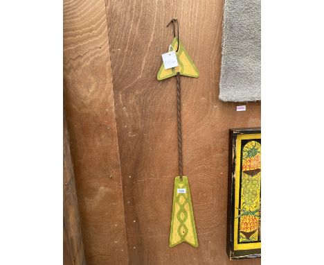 A PAINTED METAL ARROW WITH TWISTED SHAFT 