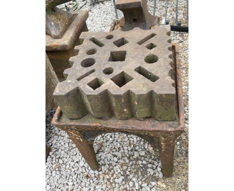 A VINTAGE SWAGE BLOCK ON A STAND 36CM X 36CM 