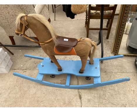 A VINTAGE ROCKING HORSE 