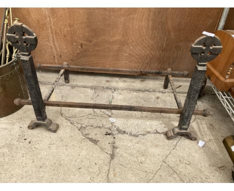 A PAIR OF CELTIC DESIGN FIRE DOGS WITH TWO BARS H:53CM L:32CM 