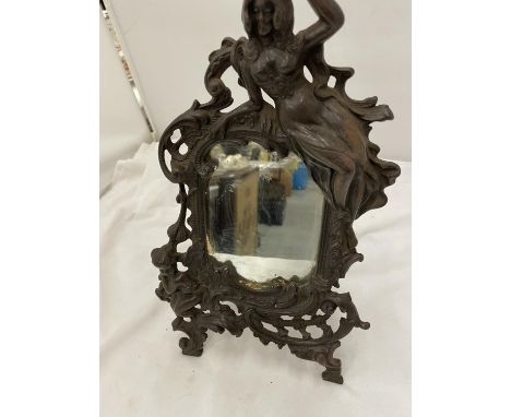 A CAST MIRROR DECORATED IN A CLASSICAL STYLE WITH A LADY, CHERUB, ETC HEIGHT 35CM, WIDTH 20CM 