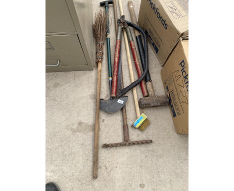 VARIOUS TOOLS TO INCLUDE A RAKE, LUMP HAMMER, BOW SAW ETC 