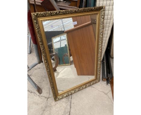 A MODERN GILT FRAMED WALL MIRROR, 34X24" 