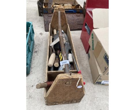 A VINTAGE WOODEN TOOL CARRIER TO INCLUDE TROWELS, SHARPENING STONE ETC 