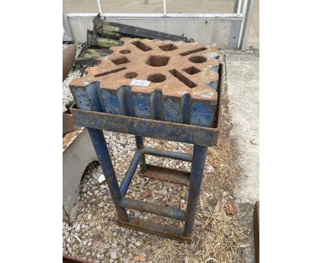 A VINTAGE SWAGE BLOCK ON A STAND 30CM X 30CM 