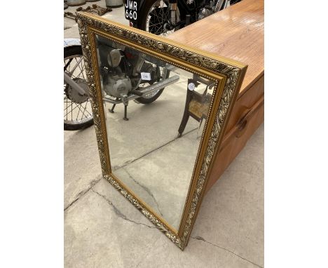 A MODERN GILT FRAMED WALL MIRROR, 34X24" 
