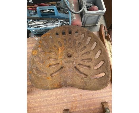 A VINTAGE TRACTOR SEAT 