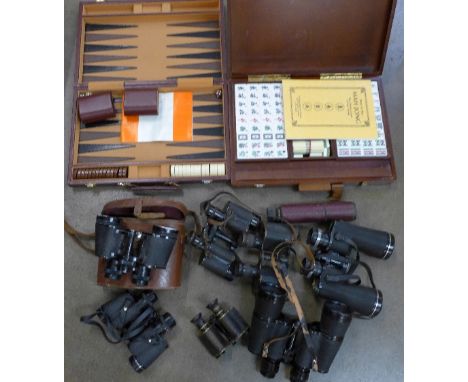 A box of binoculars, including military, a backgammon set and a Mahjong set