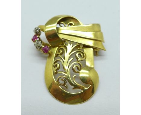 An 18ct gold, diamond and ruby brooch, 6.4g
