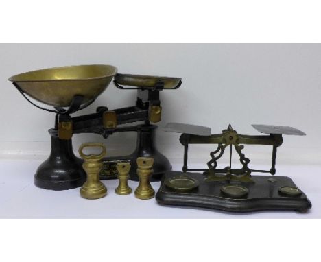A set of The Viking kitchen scales and a set of T.J. Smith London postal scales