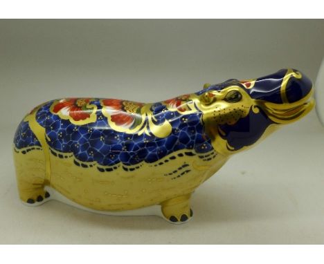 A Royal Crown Derby hippopotamus paperweight from the Gold Signature Edition, 1315 of 2500, boxed with certificate, with gold
