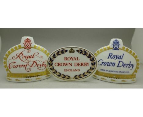 Three Royal Crown Derby paperweight Namestands, two with gold stoppers, two boxed