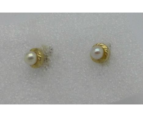 A pair of 9ct gold and seed pearl earrings