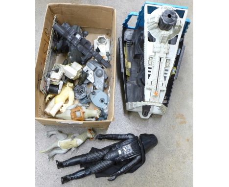 A box of Kenner Star Wars figures including laser gun
