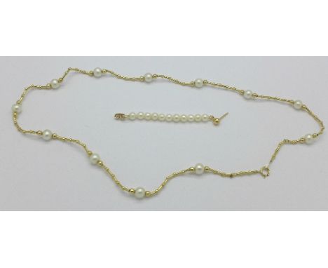 A 14ct gold mounted pearl necklace and one earring