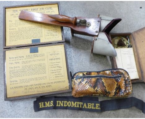 A Boots First Aid box with contents, a stereoscopic card viewer, a set of scales, a HMS Indomitable sailor's cap band and a p