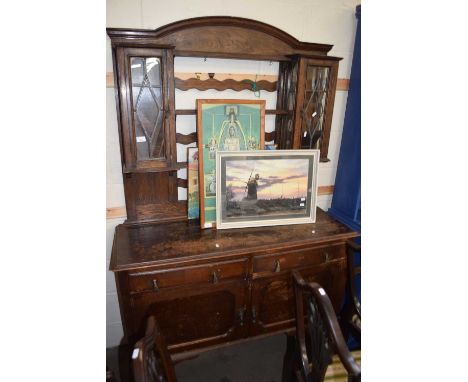 EARLY 20TH CENTURY OAK DRESSER, THE TOP SECTION WITH TWO LEAD GLAZED DOORS OVER A BASE WITH TWO DRAWERS AND TWO DOORS, RAISED