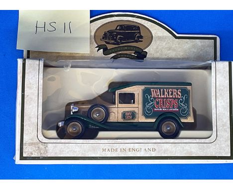 Vintage Toys. A Die-Cast metal and plastic replica of a retro Walkers Crips van. In original packaging, unopened. Mint condit