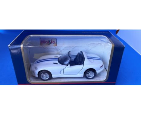 Vintage toys. Autosalone. A Die-Cast and plastic pull back action car. With opening doors. In original packaging. Mint condit