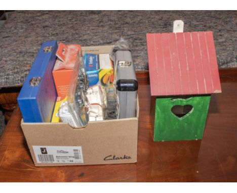 Assorted tools and a bird box