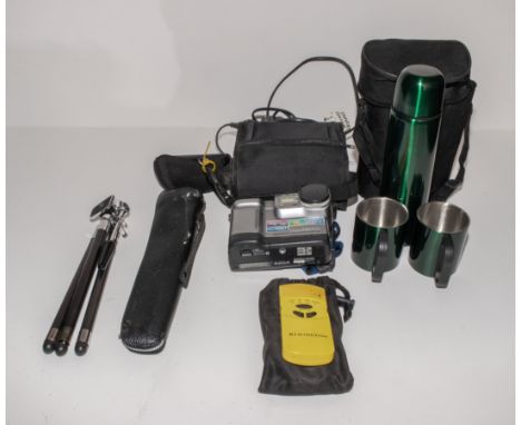 Travel flask, camera and a tripod