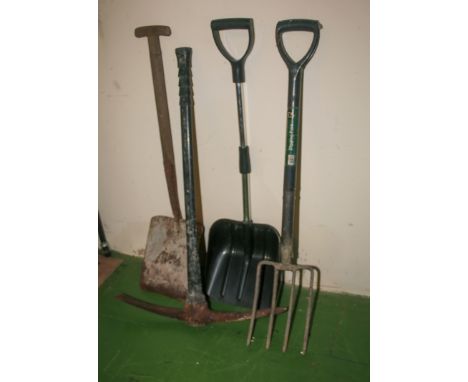 Garden fork, spade, snow shovel and a pick