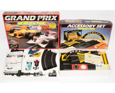 Scalextric, a group of boxed sets to include, C653 'Grand Prix' and C221 'Accessory Set'. All contents appears present but no