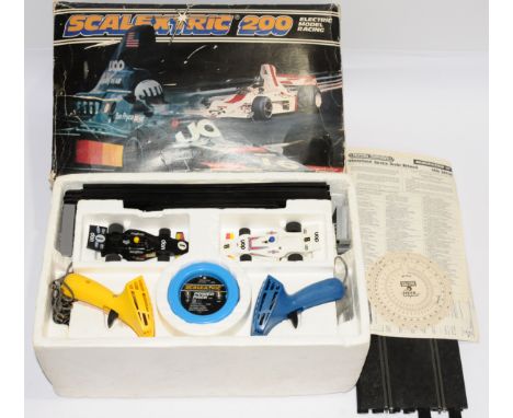 Scalextric, a boxed 'Scalextric 200' set, all contents appears present but not checked for completion. Conditions generally a