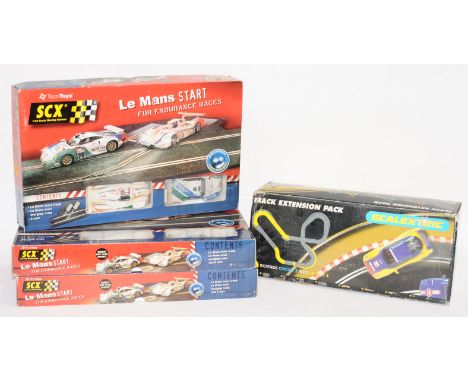 Scalextric and SCX, a mixed group and sets, to include, SCX '69050 Le Mans Start', Scalextric Track Extension. Not checked fo