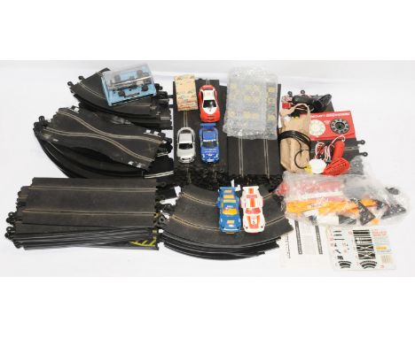 Scalextric, a mixed group to include an unboxed 'Porsche 911' set, also a selection of track (mainly flexible track), cars an