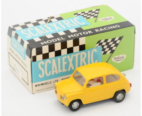 Scalextric - Spain No.C31 Seat TC 600 - Yellow with driver figure. Conditions generally appear Excellent to Near Mint in gene