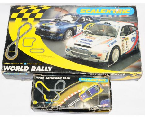 Scalextric Pair (1) Set C1048 World rally to include Subaru Impreza, Ford Focus RS (2) C8036 Track Extension Pack. Appears in