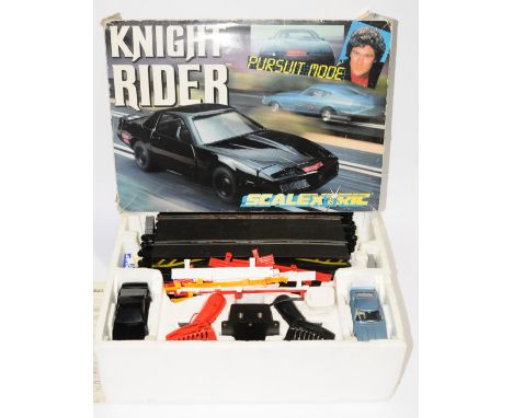 Scalextric, a boxed set of 'Scalextric Knight Rider Pursuit Mode', appears to be complete but not checked for completion. Con