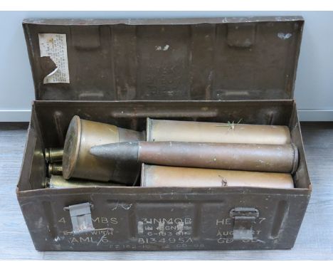 An ammunition case containing various brass shell cases