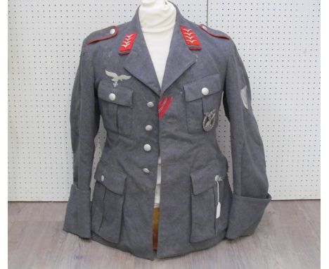 A Third Reich era German Luftwaffe blouse with Hauptgefreiter (Flak / Anti-Aircraft) insignia to collar, together with Luftwa