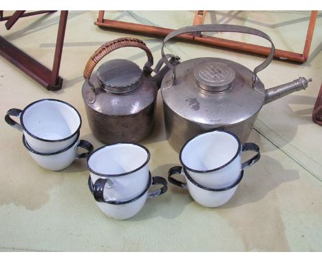 Two campaign style metal kettles including Drew &amp; Sons together with six French enamel tea cups (8)