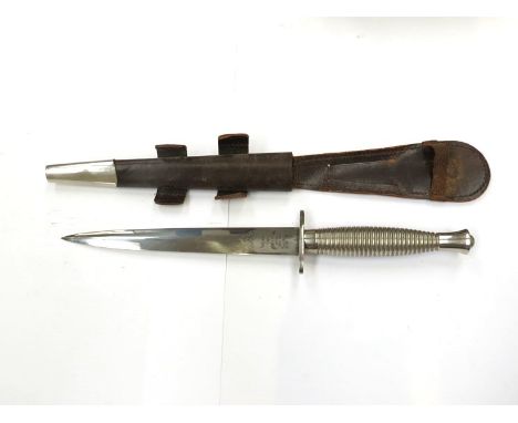 A British F-S Fighting Knife, Wilkinson Sword etched ricasso, W stamped on sheath 