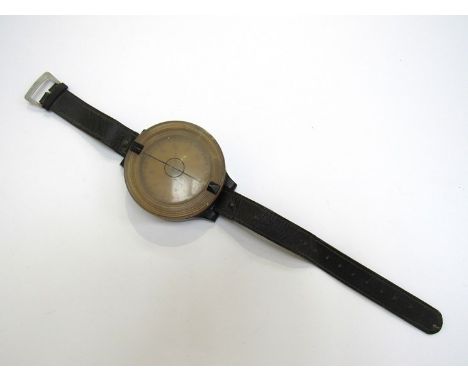 A WWII Luftwaffe pilot's wrist compass model AK39 FI 23235-1 No. 30211000, with leather strap