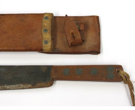 A WWI 1918 dated machete with original 1918 scabbard