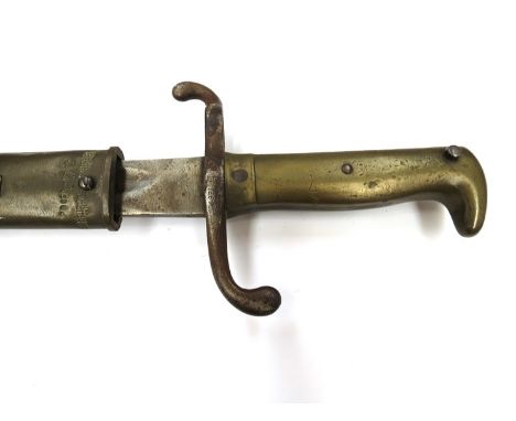 An 1869 pattern German Seitengewehr brass gripped bayonet marked 4.T.B. 186, scabbard a/f