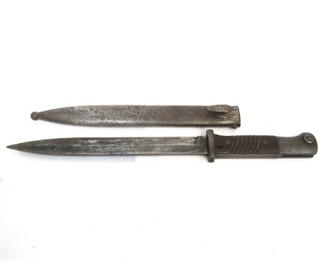 A WWII German K98 mauser bayonet by Alex Copel, Solingen. The blade dated 1945 GNJ. The numbers to the bayonet and scabbard m