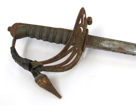 A George V officer's sword with brown leather scabbard, corroded